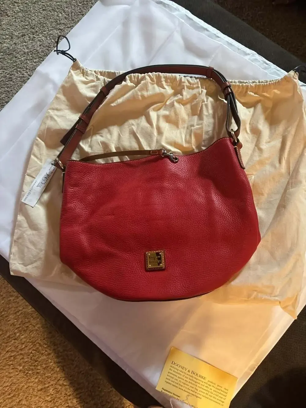 Dooney & Bourke Thea Feed Bag in Red Pebble Grain Leather